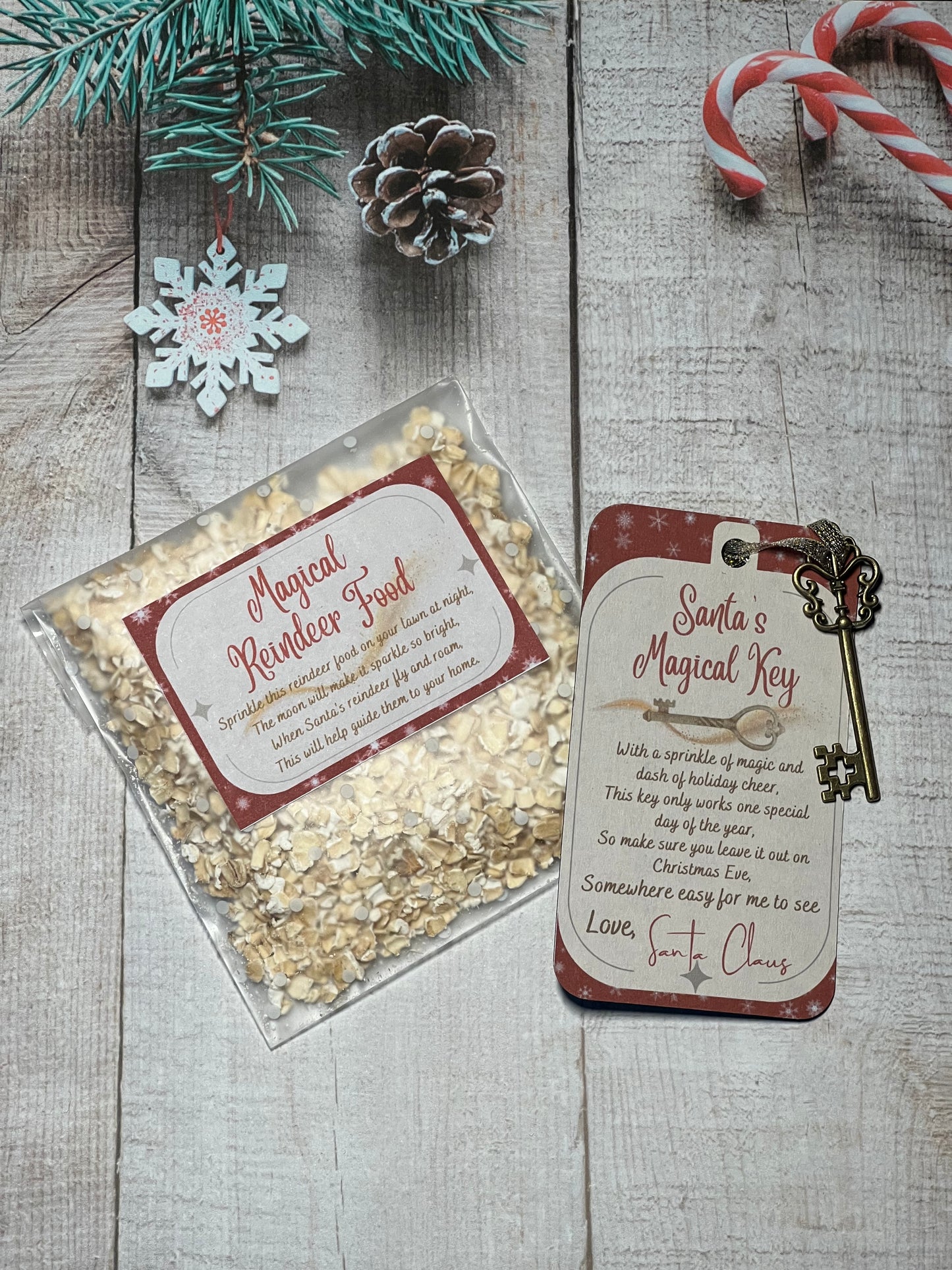 Golden metal key attached to red and cream card with the words Santa's Magic Key next to a clear packet of oats and seed with a sticker displaying the words Magical Reindeer Food.