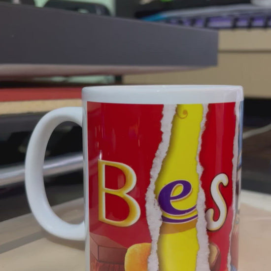 Video of a mug being spun around to show the words 'Best Dad' which are formed using letters from chocolate wrappers.