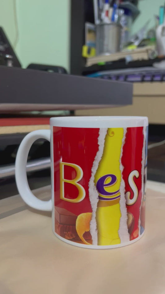 Video of a mug being spun around to show the words 'Best Dad' which are formed using letters from chocolate wrappers.